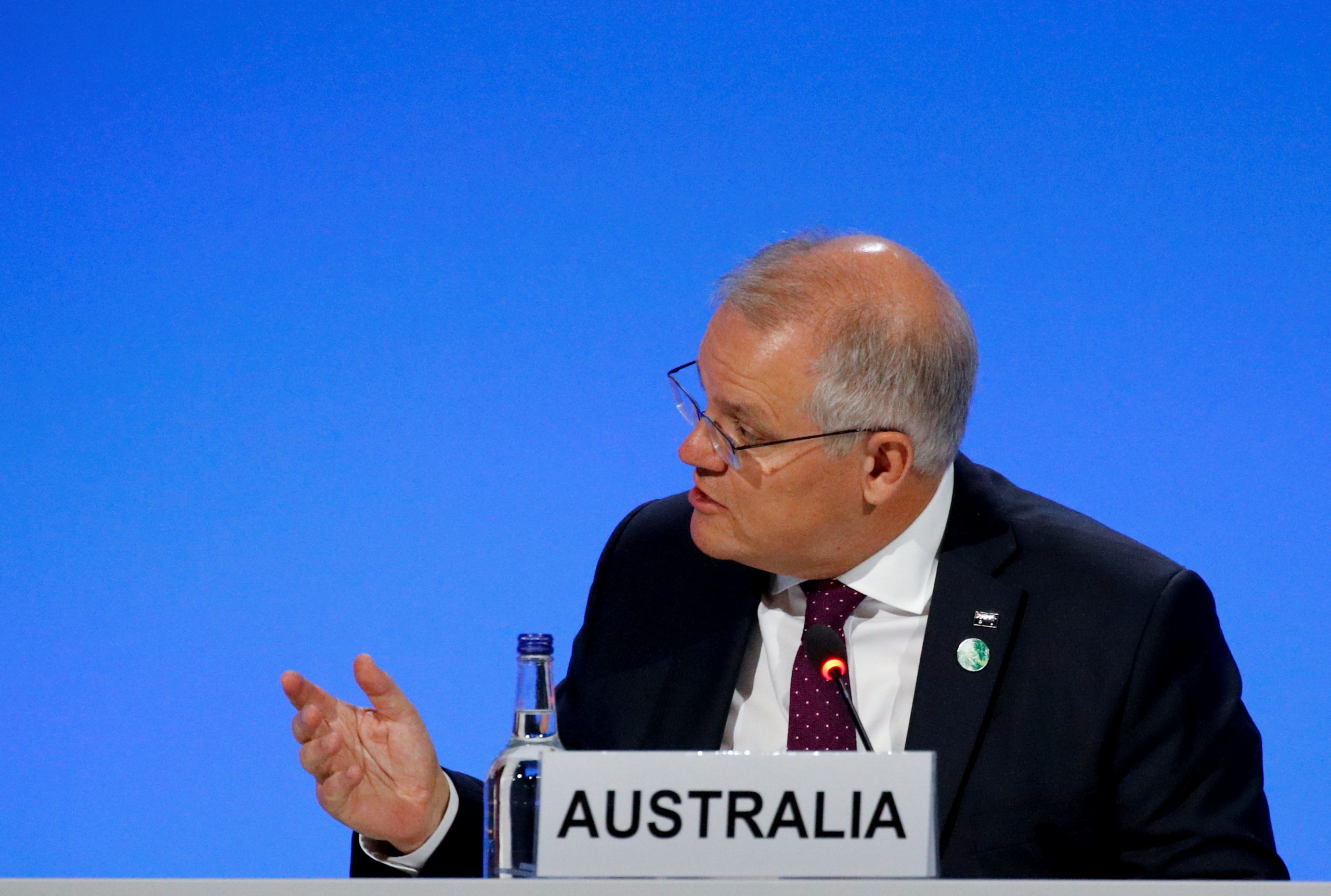 Australia bumps up investment in EV chargers, shuns sales targets
